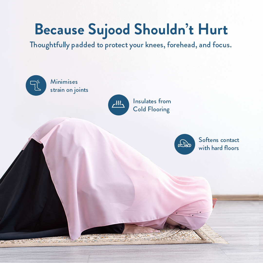 Woman in sujood on padded prayer mat with antique Indian arch design by Urban Rugs UK