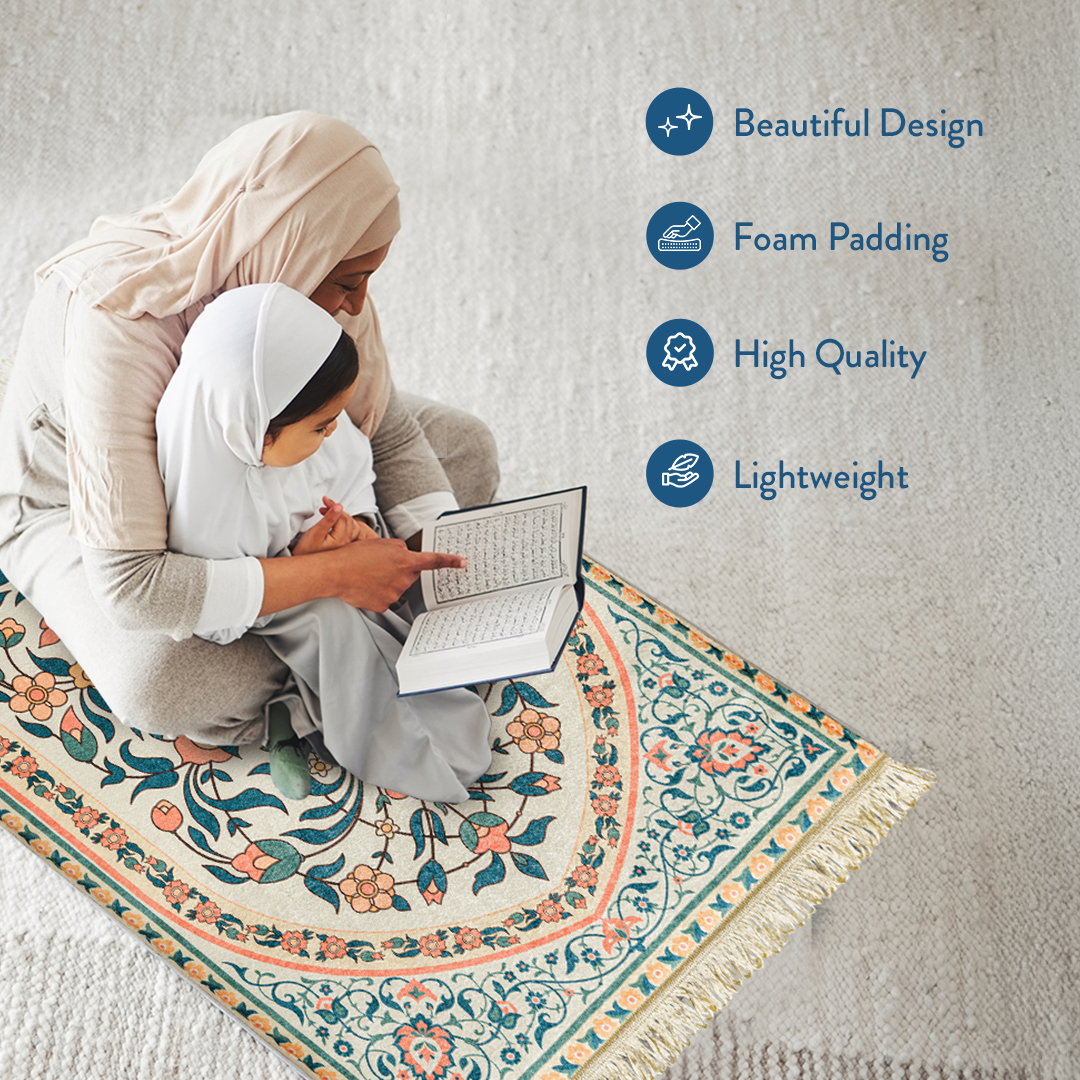 Mother and child reading Qur’an on teal and coral floral padded prayer mat by urban rugs uk