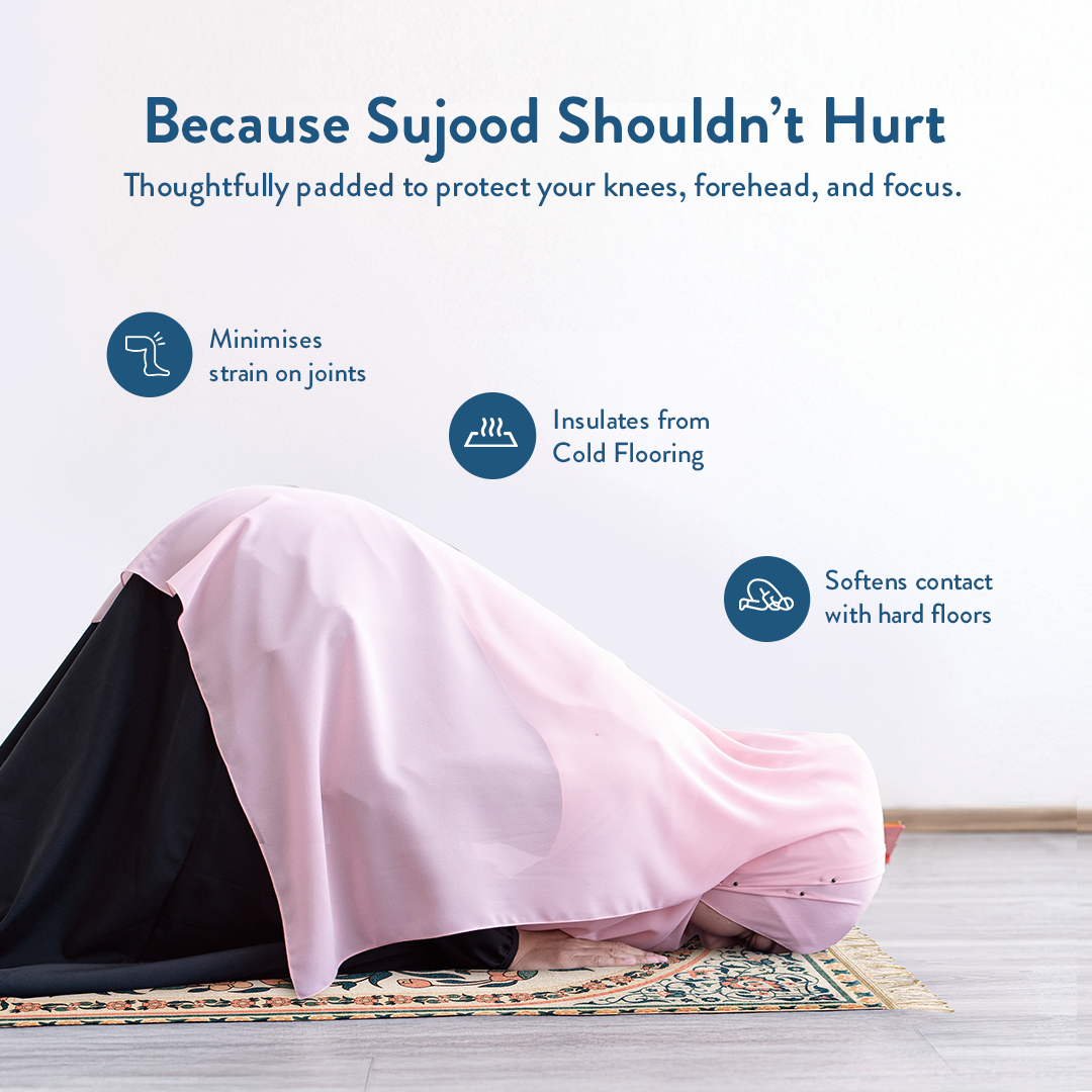 woman in prostration on padded prayer mat with teal and coral floral design by urban rugs uk