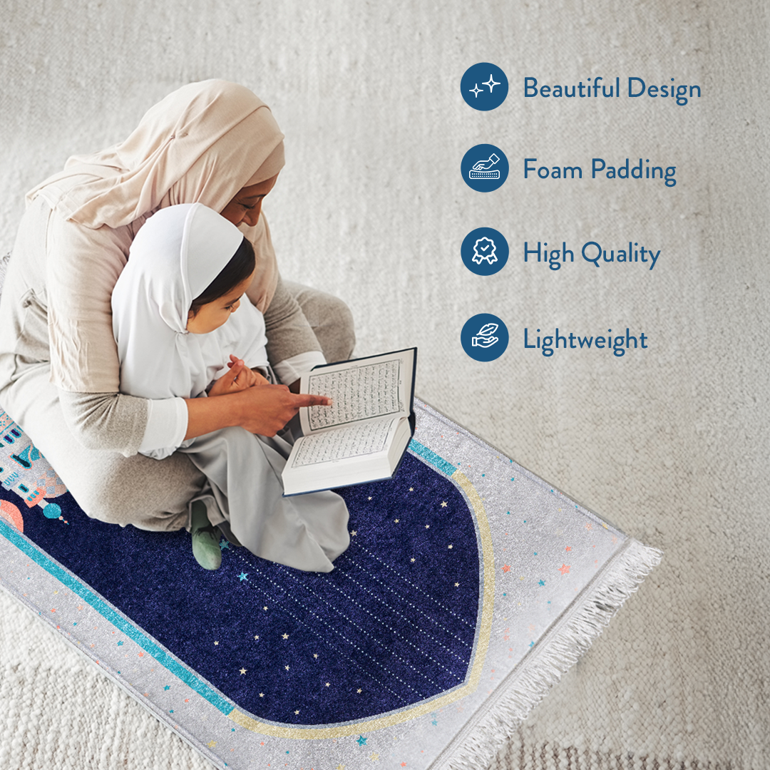 Mother and daughter reading Qur’an on Adult Padded Prayer Mat with Blue Crescent Moon Design by urban rugs uk