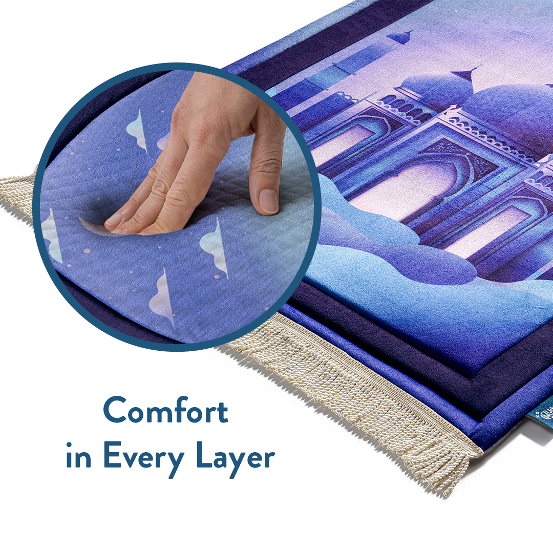 Hand pressing into soft Padded Kids Prayer Mat with Twilight Masjid Design by urban rugs uk