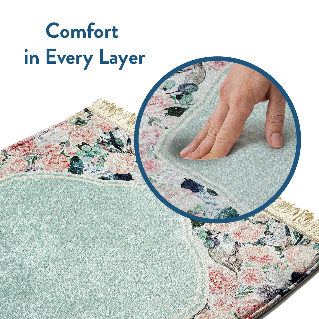 Hand pressing into Soft Mint Floral Design prayer mat by urban rugs uk