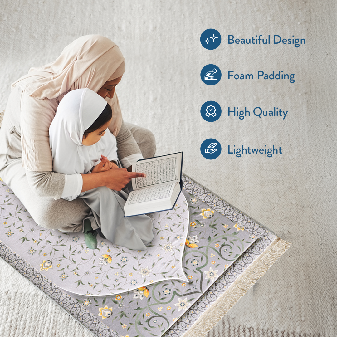mother & child reading Qur’an on padded prayer mat with floral vine design – Urban Rugs UK