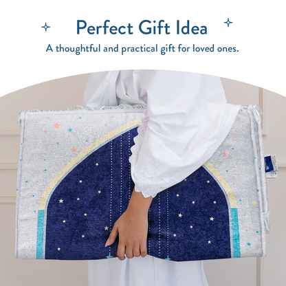 Person holding folded Adult Padded Prayer Mat with Blue Crescent Moon Design from Urban Rugs UK.